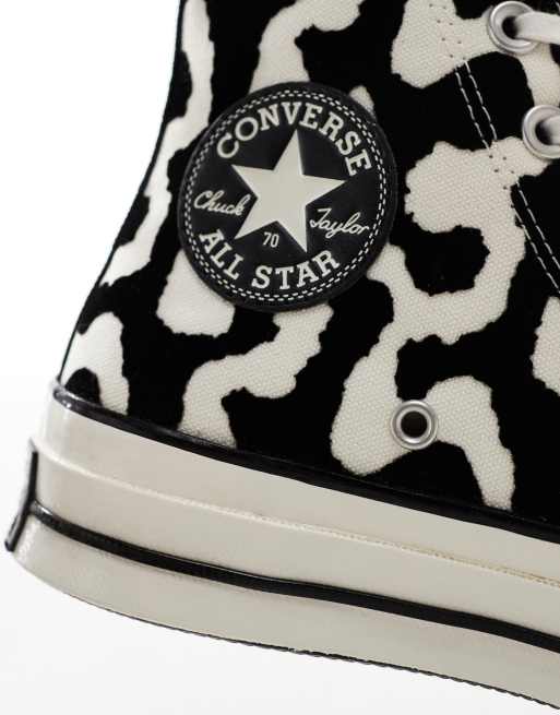 Converse Chuck 70 Hi trainers in black and white cow print