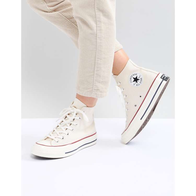 Cream store colored chucks