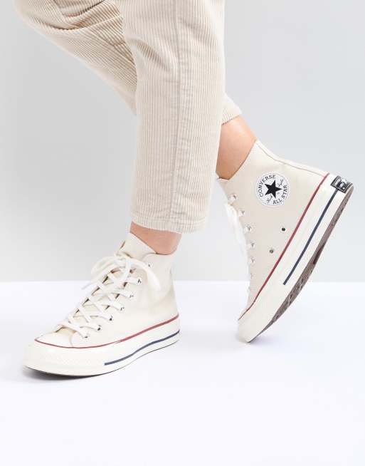 Cream colored shop chucks