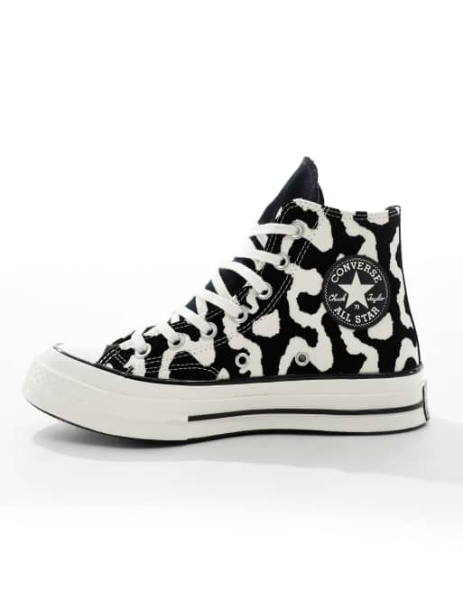 Converse Chuck 70 Hi trainers in black and white cow print