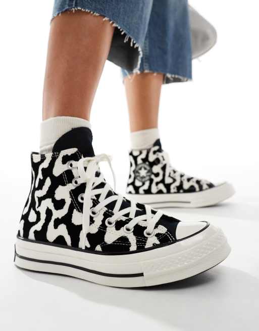 Converse Chuck 70 Hi trainers in black and white cow print