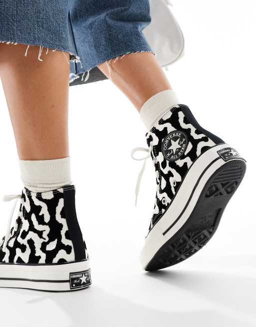 Converse Chuck 70 Hi trainers in black and white cow print