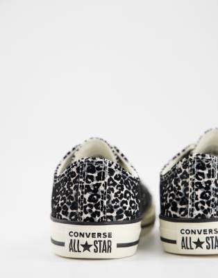 white converse with leopard print