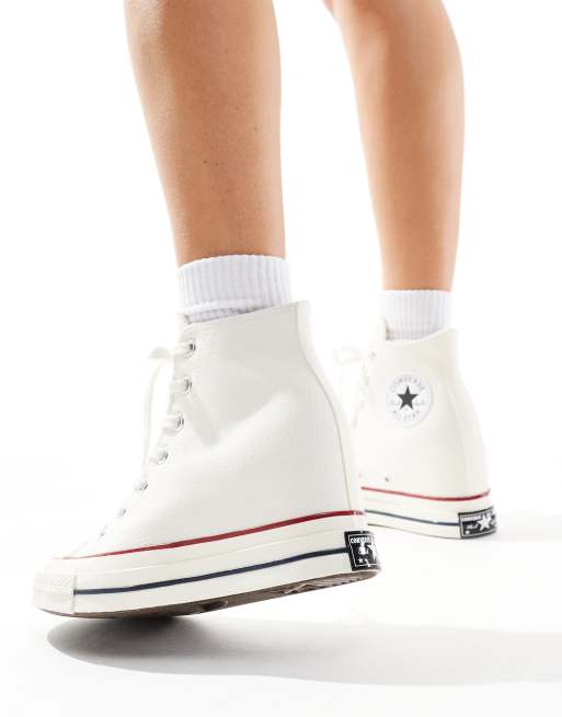 Converse con zeppa interna bianche best sale