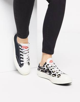 Converse - Chuck - Sneakers anni '70 basse nere con stampa floccata  leopardata | ASOS