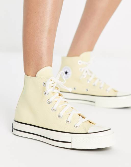 Converse store jaune pastel