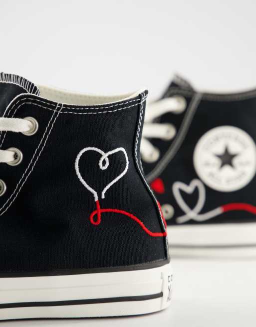 Converse noir haute avec best sale coeur rouge