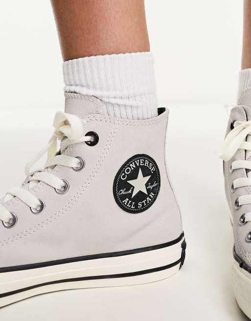 Light gray hotsell chuck taylors