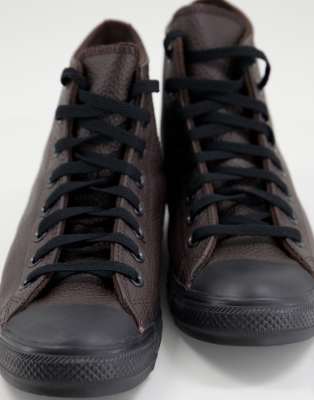 black and brown leather converse