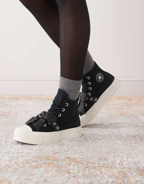 Converse Chuck Taylor All Star Hi Lift trainers in black with bows - view 1