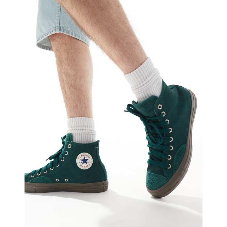 Converse Chuck Taylor All Star Hi sneakers with gum sole in dark