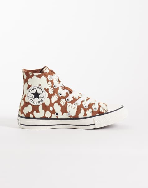 Converse Chuck Taylor All Star Hi trainers in brown and white cow print - view 1