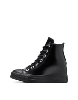 Converse - Chuck Taylor All Star - Leder-Sneaker in Schwarz mit Plateausohle und Keilabsatz