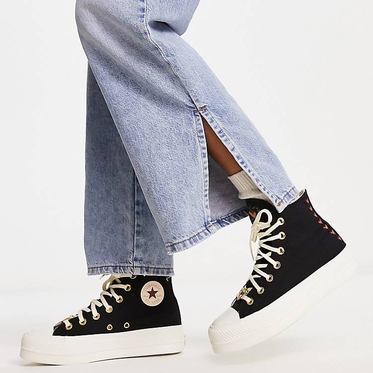 Converse Chuck Taylor All Lift platform sneakers with heart embroidery in black | ASOS