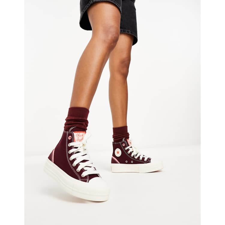 Burgundy and outlet gold converse