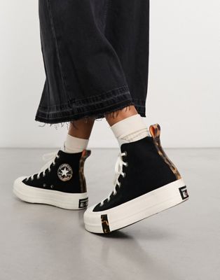 Converse Chuck Taylor All Star lift trainers in black with animal print detailing