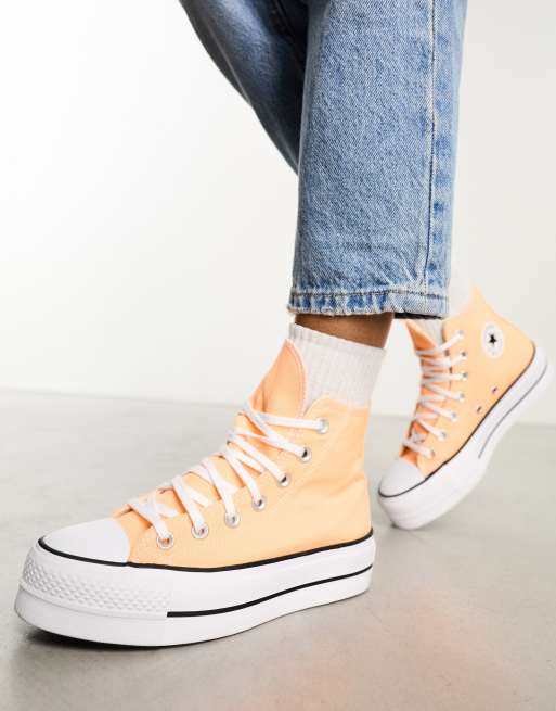 Orange chuck cheap taylors women's