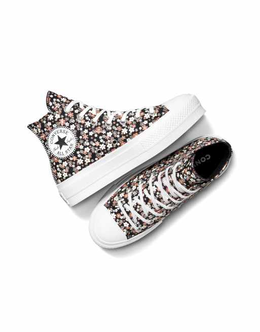 Converse Chuck Taylor All Star Lift Sneaker in Total Eclipse WeiB mit Plateausohle und kleinem Blutenblattmuster