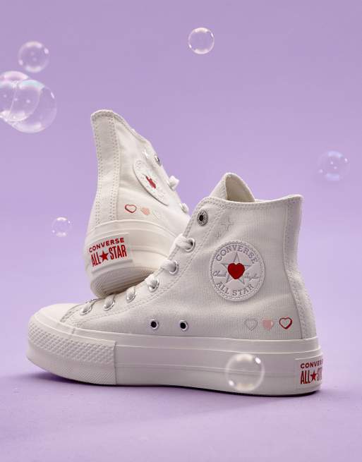 White converse hotsell with a heart