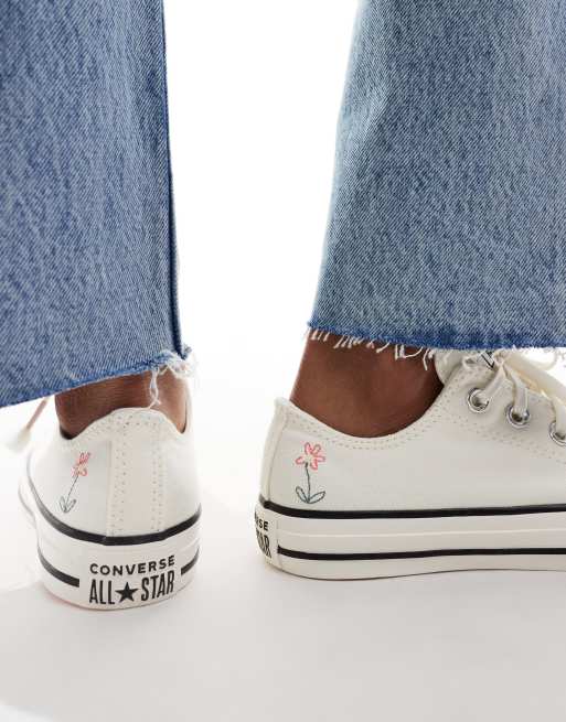 Converse Chuck Taylor All Star Ox trainers in white with flower embroidery