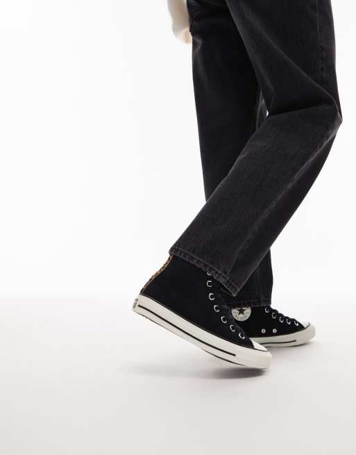 Converse – Chuck Taylor All Star – Sneaker in Schwarz mit Ponyfell-Detail