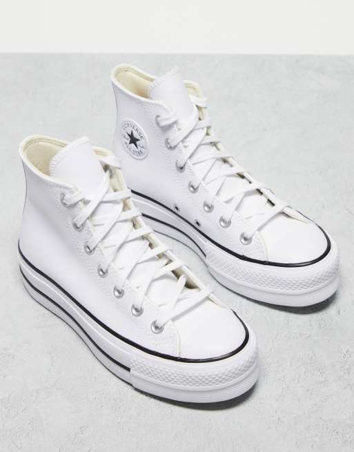 Converse bianche shop alte di pelle