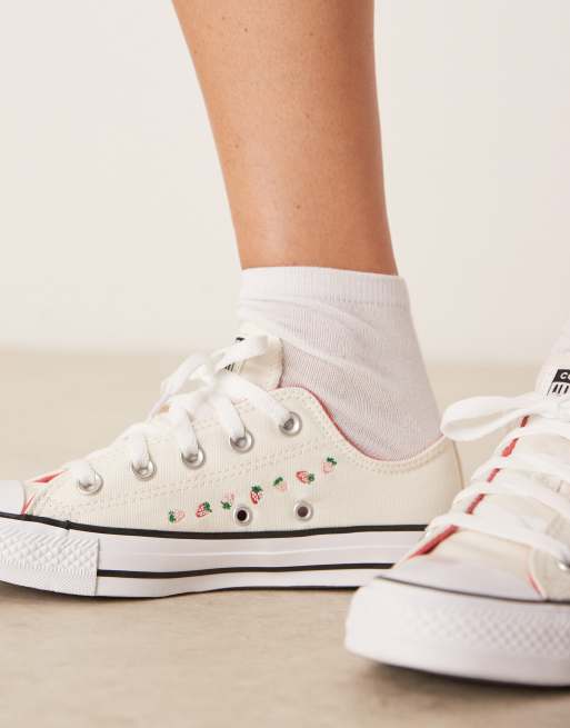 Converse Chuck Taylor All Star sneakers in white with strawberry detailing
