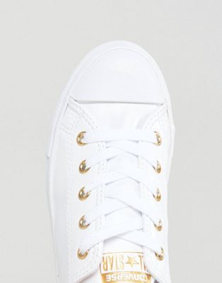 white leather converse with rose gold eyelets