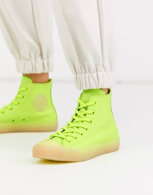 neon yellow converse high tops