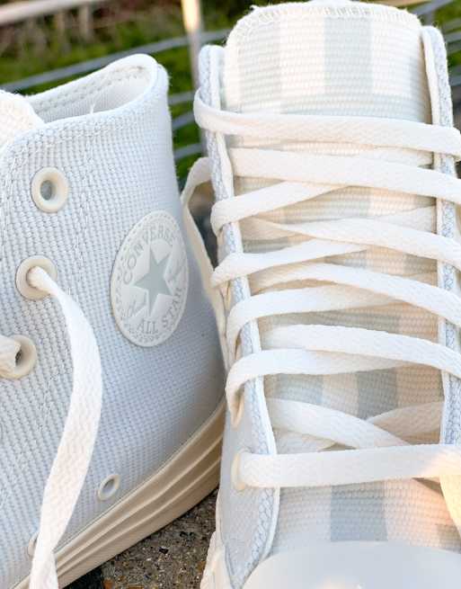 White converse with on sale blue stripe