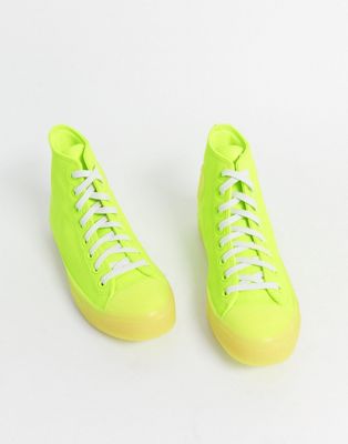 Converse Chuck Taylor leather sneakers in neon yellow | ASOS