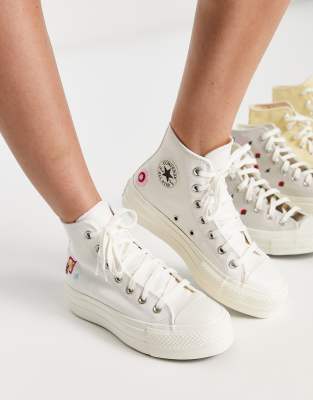 Converse - Chuck Taylor Lift - Baskets montantes à plateforme avec broderie fleur - Blanc cassé | ASOS