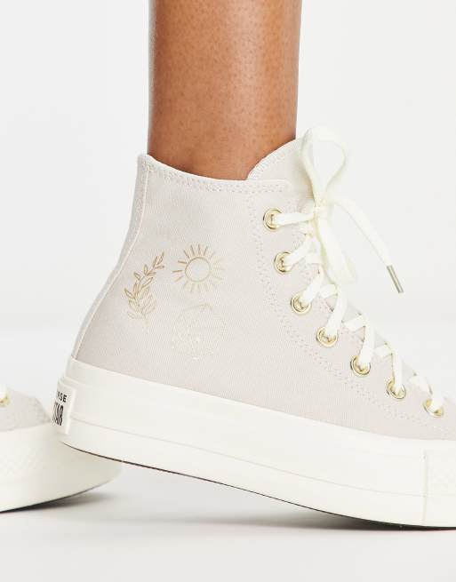 Converse Chuck Taylor Lift Hi gold detail platform trainers in