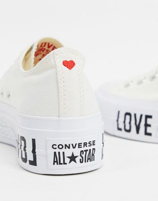 white converse with heart 