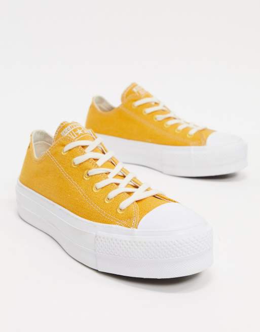 Yellow all star on sale clean lift platform trainers