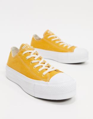 converse yellow all star clean lift platform trainers