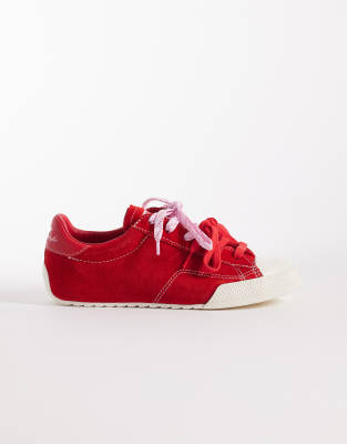 Converse Chuck Taylor Lo trainers with double lace in red