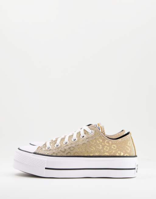 Converse Chuck Taylor Ox Baskets a semelle plateforme avec motif leopard Dore metallise ASOS