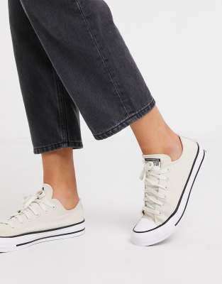 cream and black converse