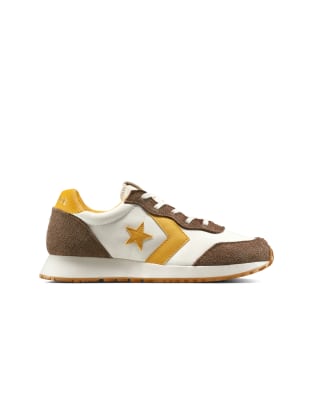  Omega trainer in egret/grounded/sunny angle