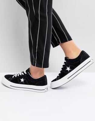 black converse with star