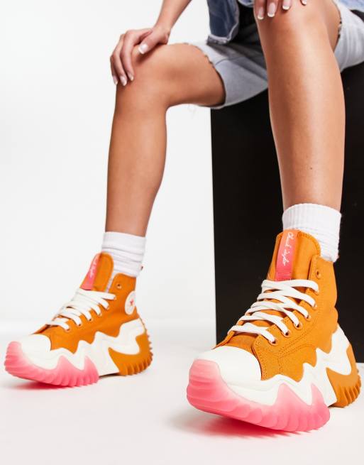 Converse Run Star Motion Hi trainers in orange and pink