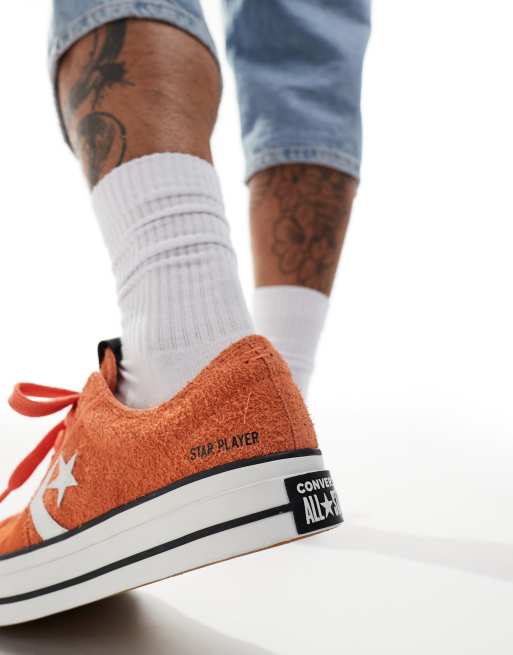 Converse Star Player 76 Ox trainers in orange ASOS