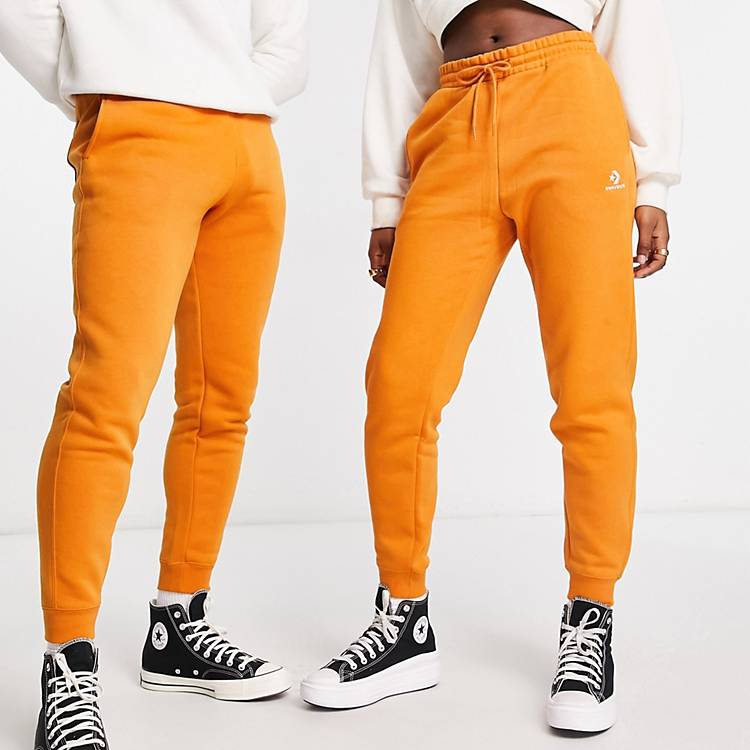 Converse unisex star chevron fleece joggers in orange | ASOS