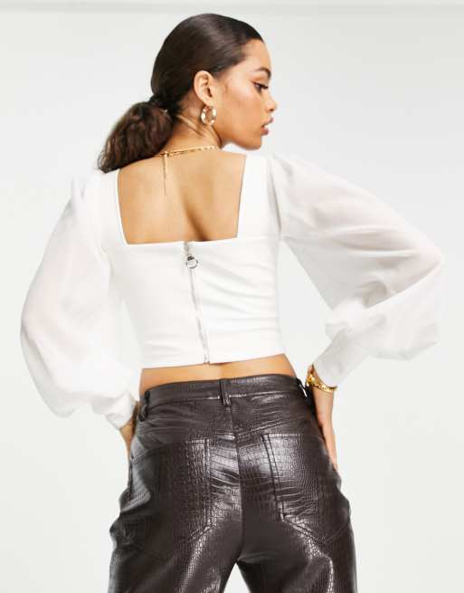 Corsé blanco de poliuretano con mangas transparentes de Parisian Petite, 2 de 4