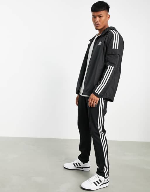 Cortavientos negro con diseno de tres bandas adicolor de adidas Originals