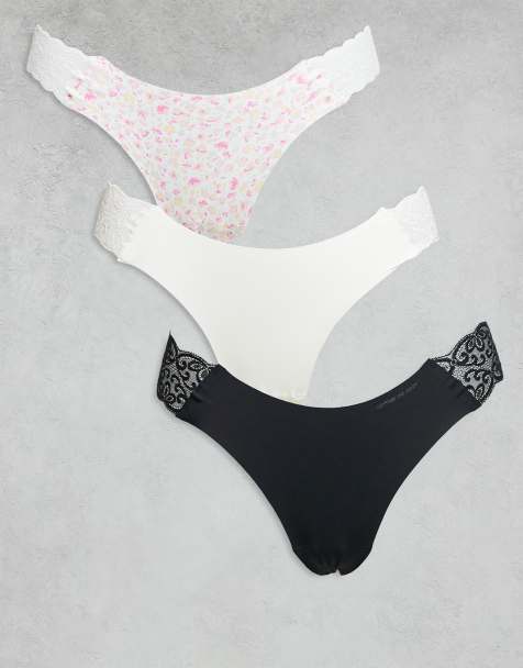 Cotton On – 3er-Pack nahtlose Tanga-Slips in Schwarz, Weiß und Orchidee - view 1