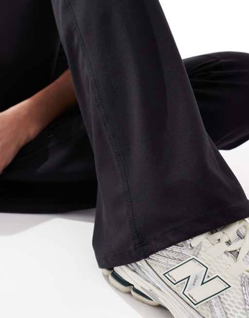 Cotton On Active ultra soft roll over flare trouser in black, 3 of 5
