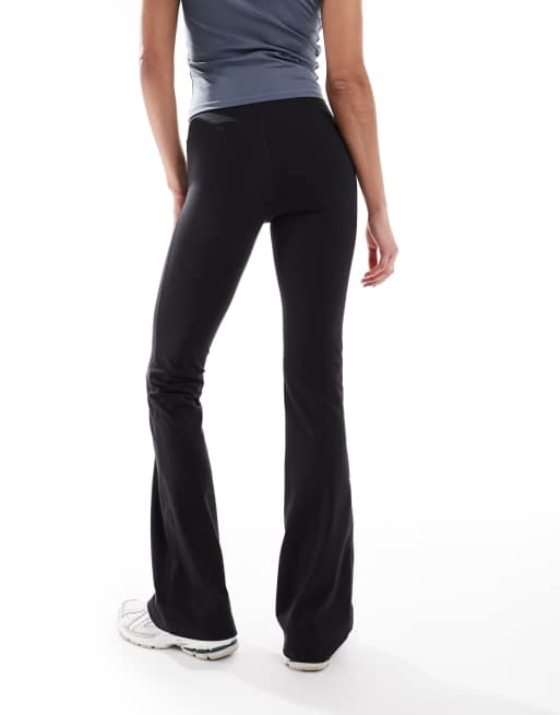 Cotton On Active ultra soft roll over waistband flare pants in black, 4 of 5