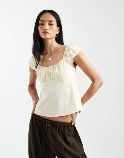 Cotton On – Babydoll-Bluse in Vanilla Glow mit Bindedetail am Rücken - view 1